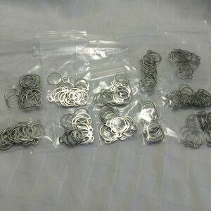 + 150 double connectors, stainless steel rings welded in an eight shape 0.3 mm t